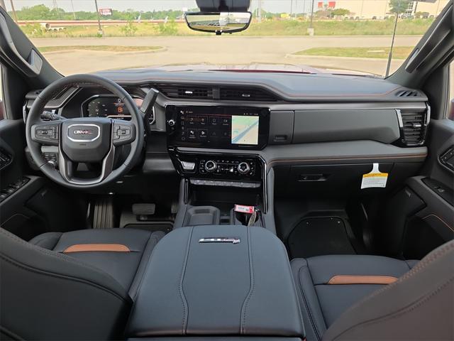 Photo of 2025 Volcanic Red Tintcoat GMC Sierra 2500