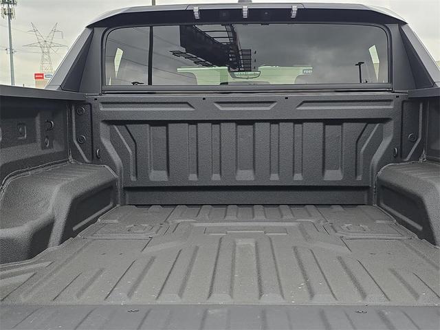 Photo of 2025 Graphite Blue Metallic GMC HUMMER EV Pickup