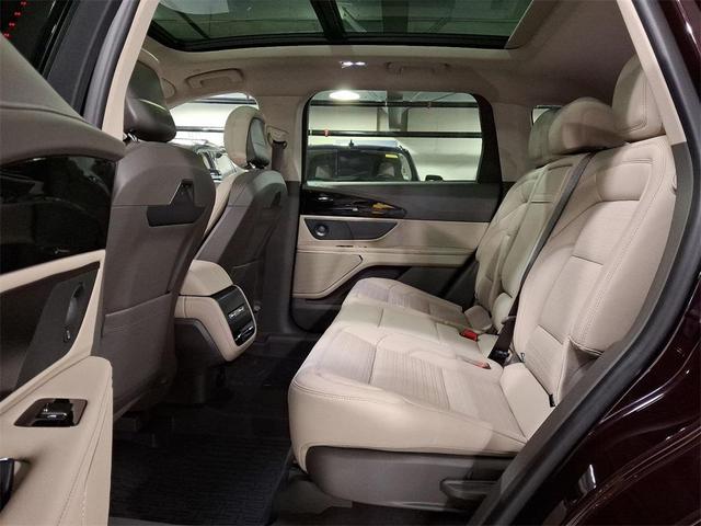 Photo of 2025 Diamond Red Metallic Tinted Clearcoat Lincoln Nautilus