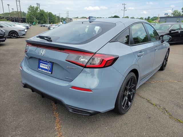 Photo of 2025 Sonic Gray Pearl Honda Civic Hybrid