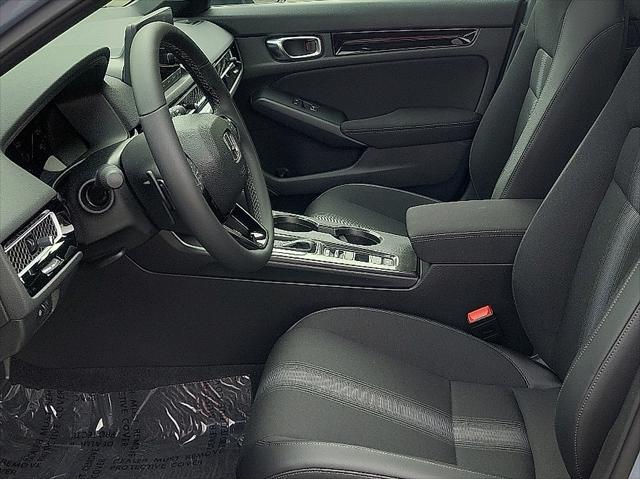 Photo of 2025 Sonic Gray Pearl Honda Civic Hybrid