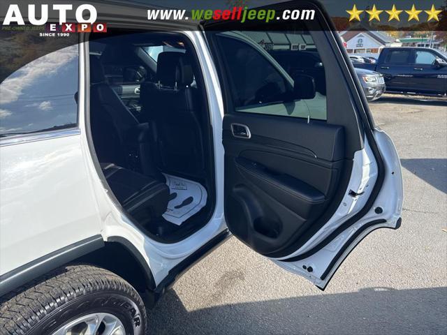 Photo of 2015 Bright White Clearcoat Jeep Grand Cherokee