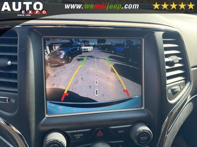 Photo of 2015 Bright White Clearcoat Jeep Grand Cherokee