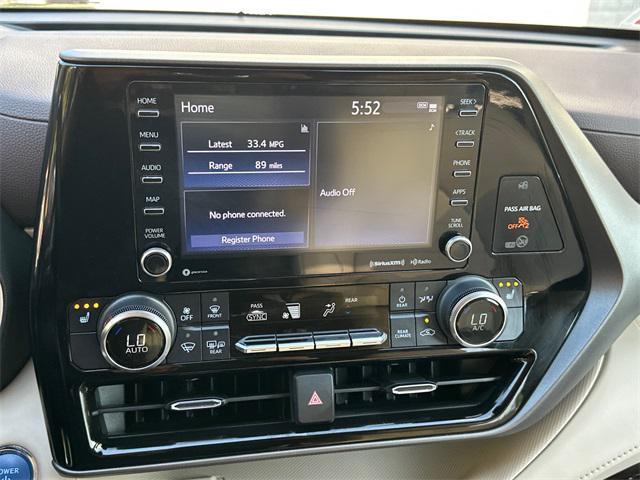 Photo of 2022 Midnight Black Toyota Highlander Hybrid