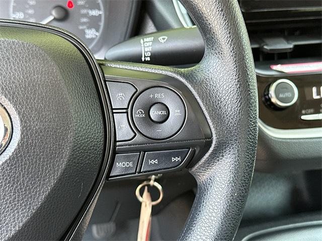 Photo of 2024 Midnight Black Metallic Toyota Corolla
