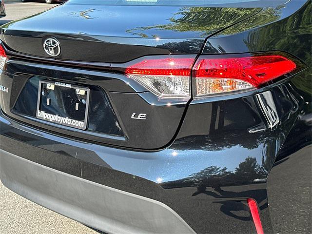 Photo of 2024 Midnight Black Metallic Toyota Corolla