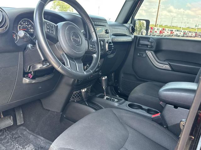 Photo of 2016 Black Clearcoat Jeep Wrangler Unlimited