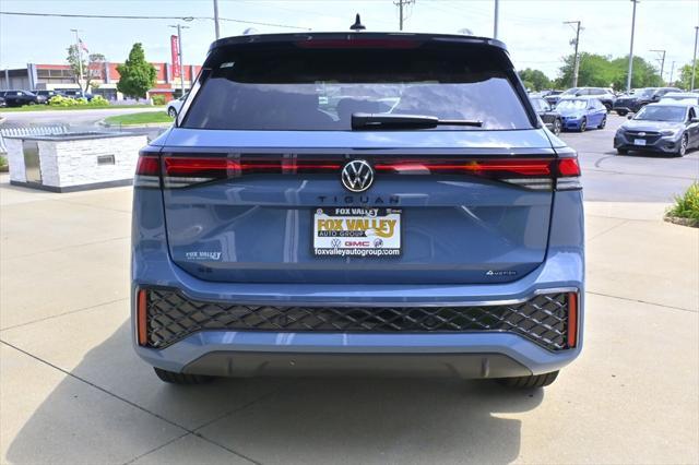 Photo of 2025 Monterey Blue w/Deep Black Roof Volkswagen Tiguan