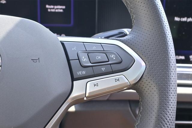 Photo of 2025 Monterey Blue w/Deep Black Roof Volkswagen Tiguan