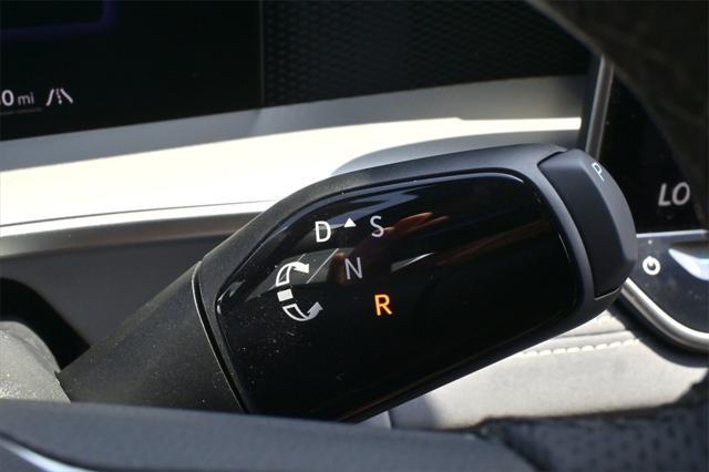 Photo of 2025 Monterey Blue w/Deep Black Roof Volkswagen Tiguan