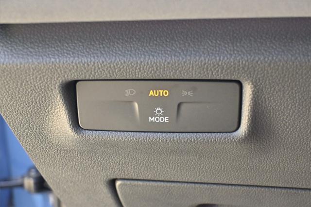 Photo of 2025 Monterey Blue w/Deep Black Roof Volkswagen Tiguan