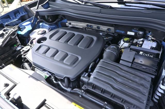 Photo of 2025 Monterey Blue w/Deep Black Roof Volkswagen Tiguan