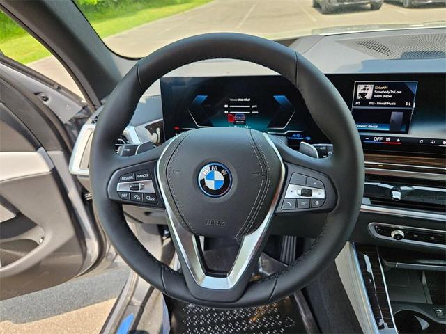 Photo of 2026 Skyscraper Grey Metallic BMW X5 PHEV