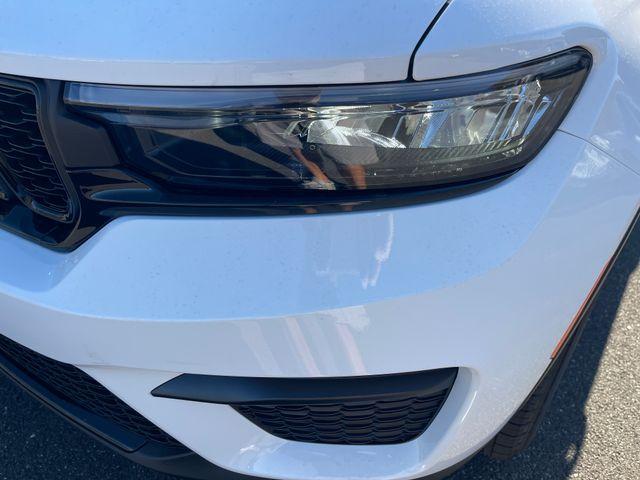 Photo of 2025 Bright White Clearcoat Jeep Grand Cherokee