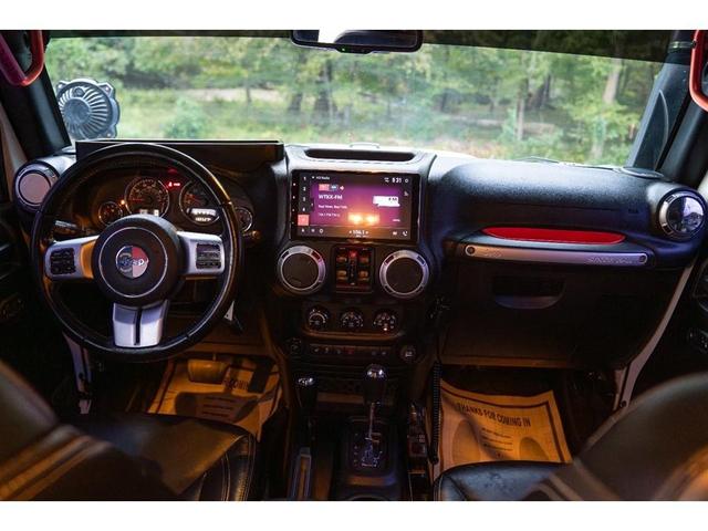 Photo of 2017 Bright White Clearcoat Jeep Wrangler Unlimited