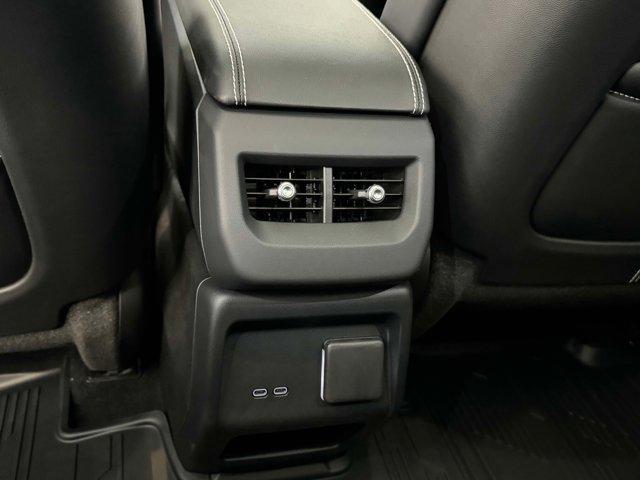 Photo of 2025 Coastal Blue Metallic Cadillac OPTIQ