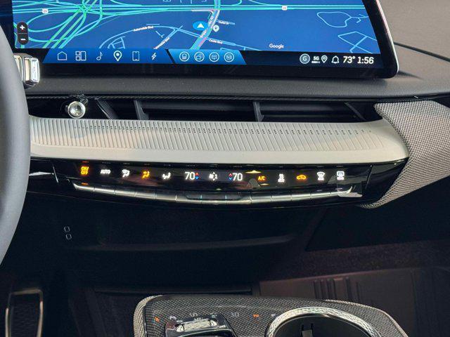 Photo of 2025 Coastal Blue Metallic Cadillac OPTIQ