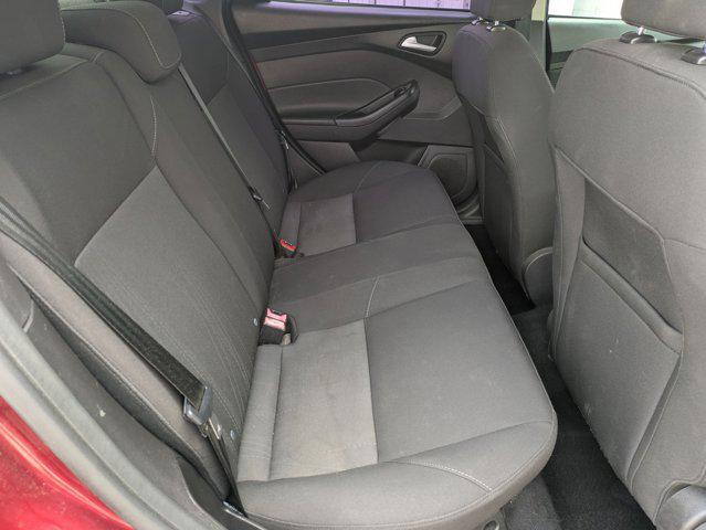 Photo of 2015 Ruby Red Metallic Tinted Clearcoat Ford Focus