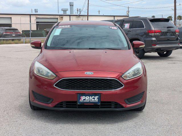 Photo of 2015 Ruby Red Metallic Tinted Clearcoat Ford Focus