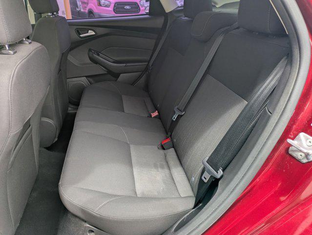 Photo of 2015 Ruby Red Metallic Tinted Clearcoat Ford Focus