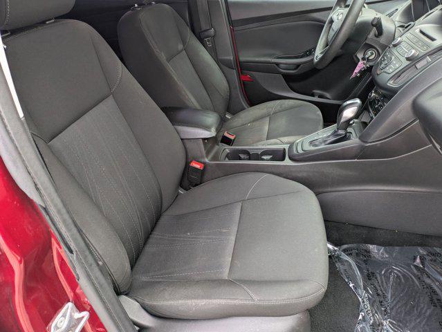 Photo of 2015 Ruby Red Metallic Tinted Clearcoat Ford Focus