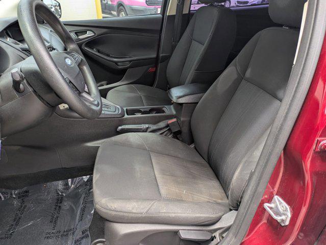 Photo of 2015 Ruby Red Metallic Tinted Clearcoat Ford Focus