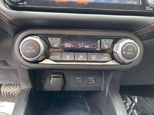 Photo of 2024 Aspen White Tricoat Nissan Versa