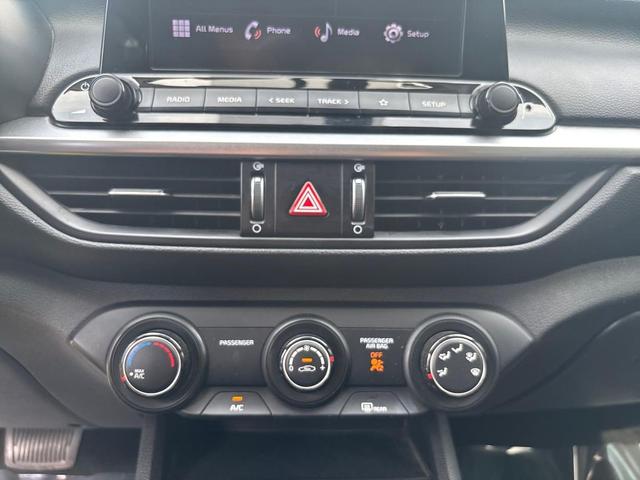Photo of 2022 Currant Red Kia Forte