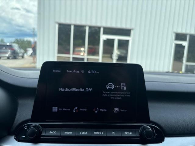 Photo of 2022 Currant Red Kia Forte