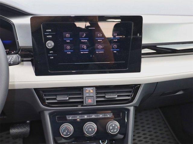 Photo of 2025 Deep Black Pearl Volkswagen Taos