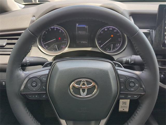 Photo of 2023 Midnight Black Metallic Toyota Camry