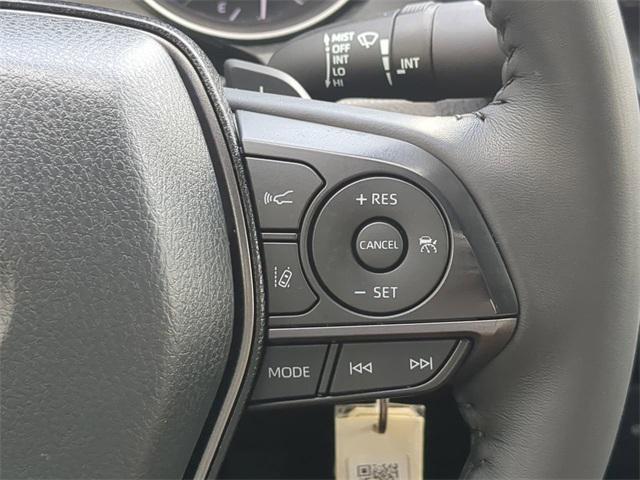 Photo of 2023 Midnight Black Metallic Toyota Camry