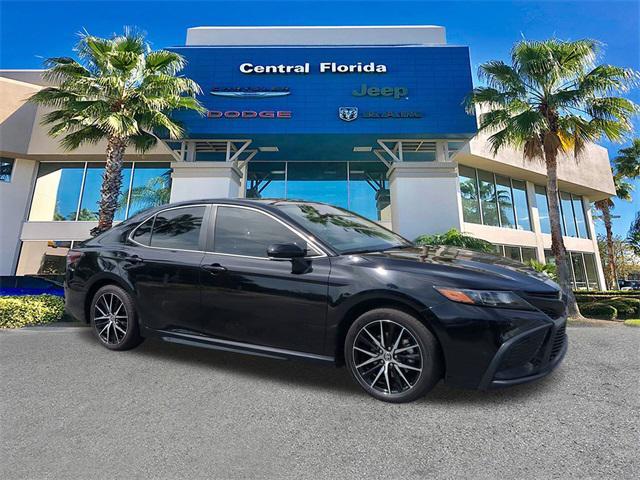 Photo of 2023 Midnight Black Metallic Toyota Camry