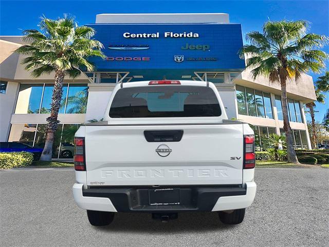 Photo of 2024 Glacier White Nissan Frontier