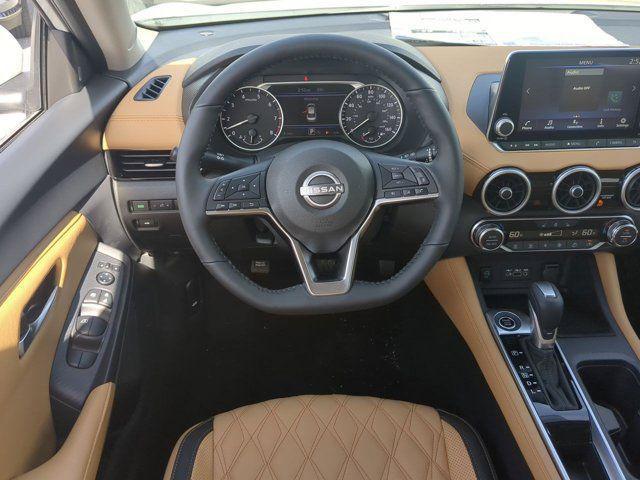 Photo of 2025 Aspen White Tricoat Nissan Sentra