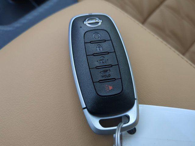 Photo of 2025 Aspen White Tricoat Nissan Sentra