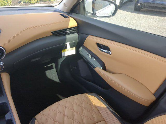 Photo of 2025 Aspen White Tricoat Nissan Sentra