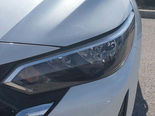 Photo of 2025 Aspen White Tricoat Nissan Sentra