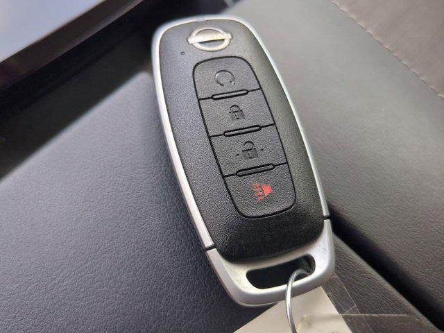 Photo of 2023 Scarlet Ember Tintcoat Nissan Rogue