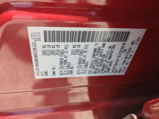 Photo of 2023 Scarlet Ember Tintcoat Nissan Rogue