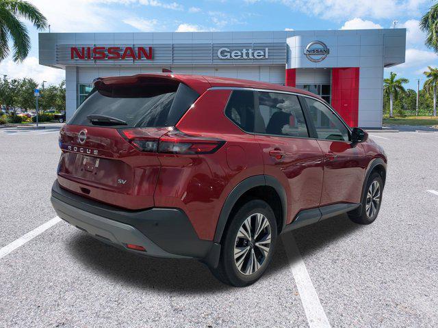 Photo of 2023 Scarlet Ember Tintcoat Nissan Rogue