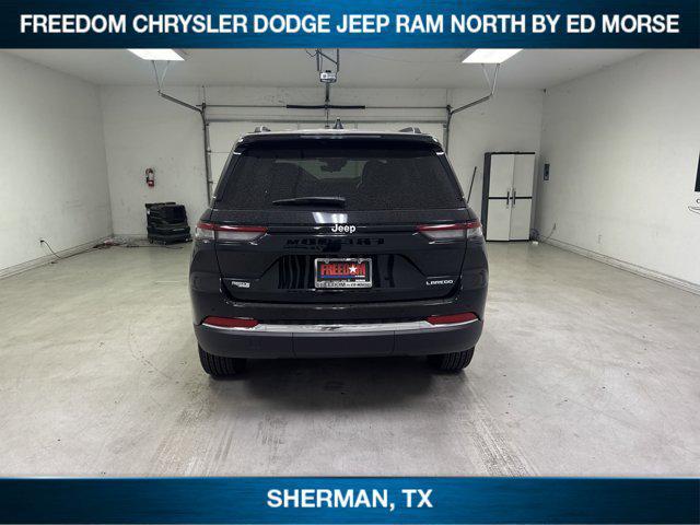 Photo of 2025 Diamond Black Crystal Pearlcoat Jeep Grand Cherokee