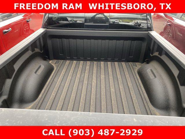Photo of 2025 Diamond Black Crystal Pearlcoat RAM 1500