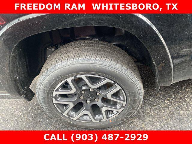 Photo of 2025 Diamond Black Crystal Pearlcoat RAM 1500