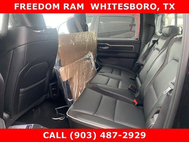 Photo of 2025 Diamond Black Crystal Pearlcoat RAM 1500