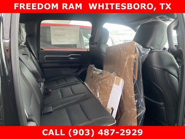 Photo of 2025 Diamond Black Crystal Pearlcoat RAM 1500