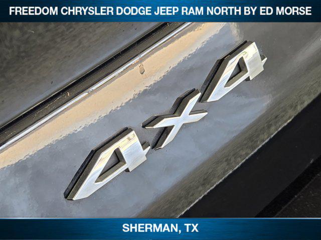 Photo of 2024 Diamond Black Crystal Pearlcoat Jeep Grand Cherokee