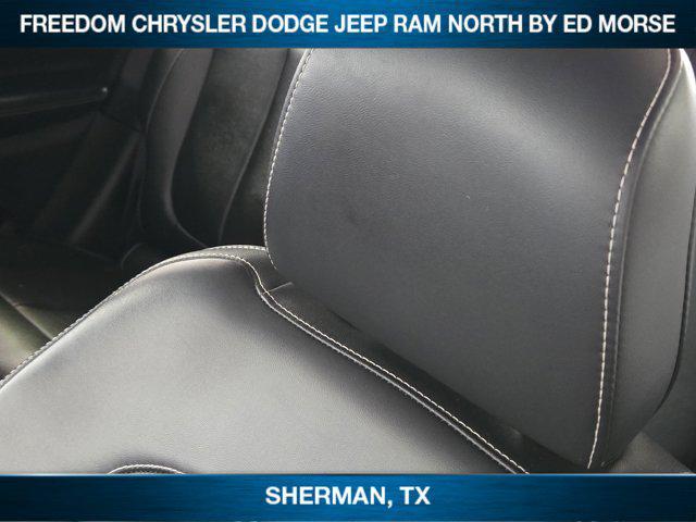 Photo of 2024 Diamond Black Crystal Pearlcoat Jeep Grand Cherokee
