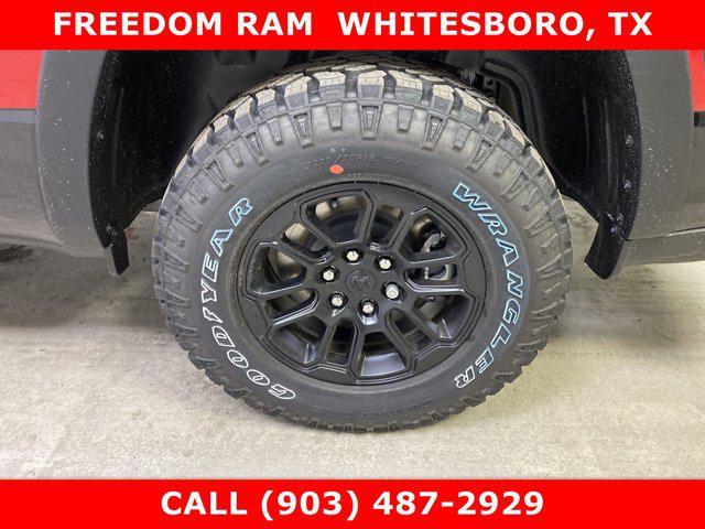 Photo of 2025 Flame Red Clearcoat RAM 1500