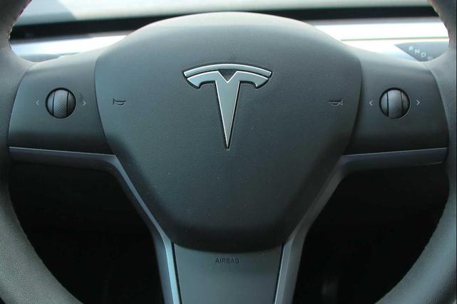 Photo of 2023 Midnight Silver Metallic Tesla Model Y